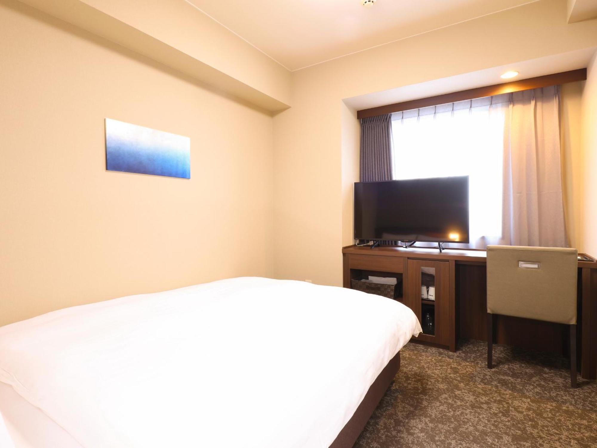Tennen Onsen Taho-No-Yu Dormy Inn Niigata Quarto foto